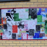 Picture of the second  large colourful mural fix to a wall in the Primary playground