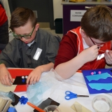 Picture of two pupils doing art work