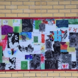 Picture of the first large colourful mural fix to a wall in the Primary playground