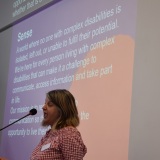 Picture of a member of SENSE during their presentation at the conference