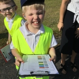 Pupil from class 2 performing a transport survey