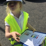 Pupil from class 2 performing a transport survey