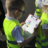 Pupil from class 2 performing a transport survey