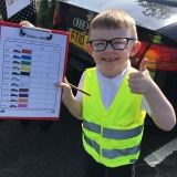 Pupil from class 2 performing a transport survey