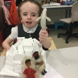 Pupil making igloo