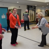 Picture of staff member and pupil training with the GAA