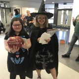 Picture of a staff member and a pupil in fancy dress during theHallow Green day