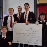 Picture of pupils with their storyboard outlining the photographs they need to take