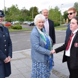 Picture of the Lord Lieutenant of Antrim shaking hands with a pupil