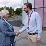 Picture of the Lord Lieutenant of Antrim shaking hands with a member of the teaching staff