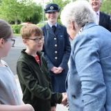 Picture of the  Lord Lieutenant of Antrim shaking hands with a pupil