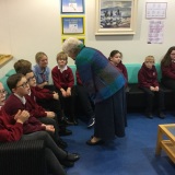 Photograph of Mrs Joan Christie speaking to pupils