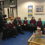 Photograph of Alderman John Smith speaking to pupils