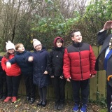 Photograph of Alderman John Smith  and  the pupils in the nature reserve