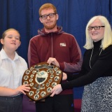 Photograph of Ms Rosaleen Dempsye and two pupils with their special awards