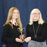 Photograph of Ms Rosaleen Dempsye and a pupil  with their special awards