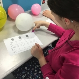 Photograph of a pupil taken their fingerprints