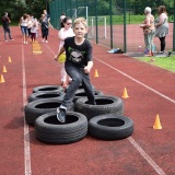 Photograph of a pupil on the mini assault course