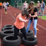 Photograph of a pupil on the mini assault course