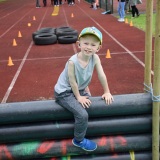 Photograph of a pupil on the mini assault course