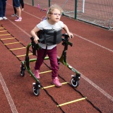 Photograph of a pupil on the mini assault course