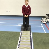 Photograph of a pupil about to long jump