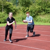 Photograph of two pupils during a tag rugby game