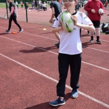 Photograph of a pupil about to pass a rugby ball