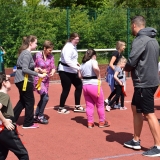 Photograph of pupils and staff during a game of tag rugby