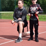 Photograph of a ruby development officer with a pupil