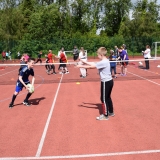 Photograph of pupils passing a rugby ball